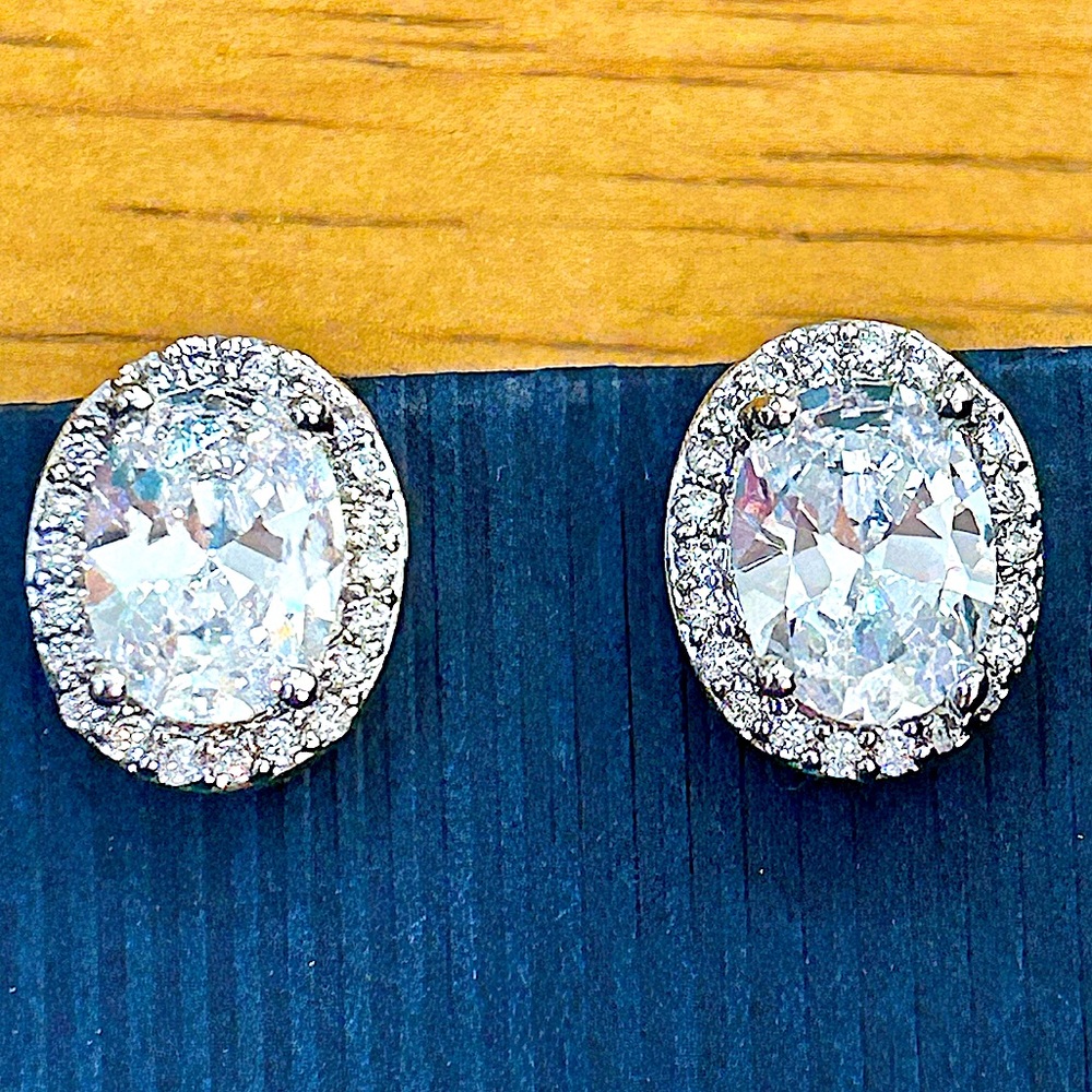 Crystal clip in stud earrings with halo detail in silver